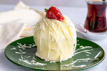 Strawberry mini cake on a white background. Cake with strawberry and cream filling. Bakery products. Close-up. local name babaroski cake