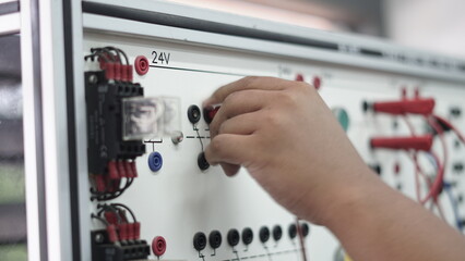 hand of the electrician. Pneumatic. Electric power station.