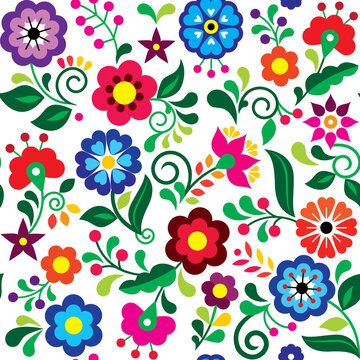 Floral seamless vector pattern inspired by traditional folk art embroidery designs from Mexico - textile or farbic print ornament
 