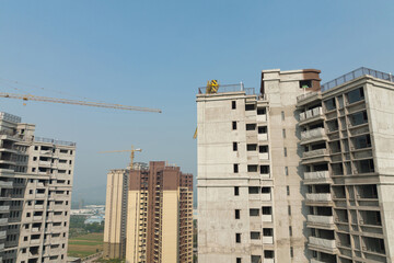 Fototapeta premium Aerial view of multistory apartment construction site in China