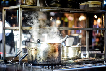 Pot of boiling water in a kitchen 