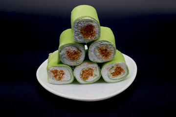 Pandan Roll Cake with Foi Thong Green Pandan Chiffon stuffed with soft white cream filling,Include Clipping Path.