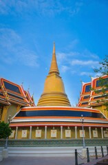 Fototapeta premium Wat Ratchabophit, a temple with a large golden chedi.