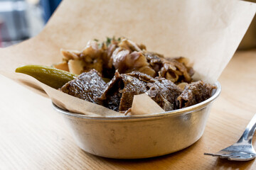 Slices of beef served with vegetables