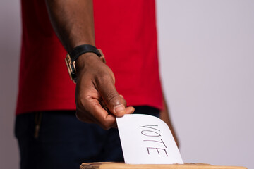 african man casting a vote