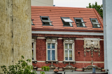 old house with windows , image taken in stettin szczecin west poland, europe - obrazy, fototapety, plakaty