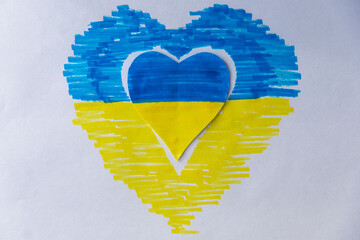 children's creativity yellow-blue heart flag of Ukraine white background