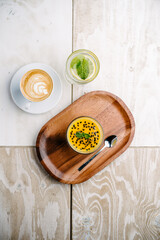 panna cotta with mango and passion fruit sauce. top view