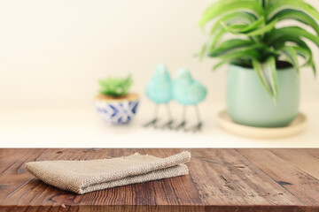 empty table board and defocused indoor background. product display concept