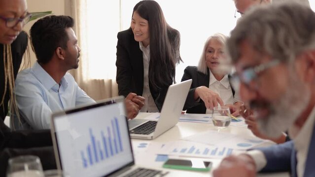Multiracial business people working together inside modern bank office - Diverse Multi generational conference