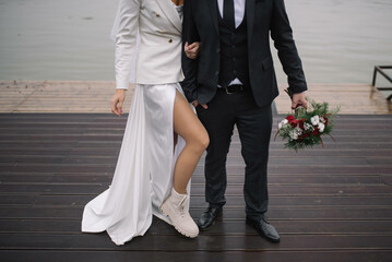 Happy guy and girl In casual outfit . Hipster man and girl wedding day. 