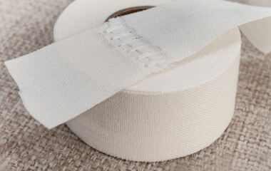 white medical adhesive tape. marriage tape. manufacturing defect example.