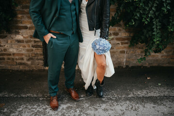 Happy guy and girl In casual outfit . Hipster man and girl wedding day. 