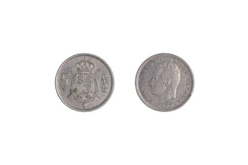 5 ptas coin of Spain, issued in 1975. Juan Carlos I rey de Espana. Black background, close-up.