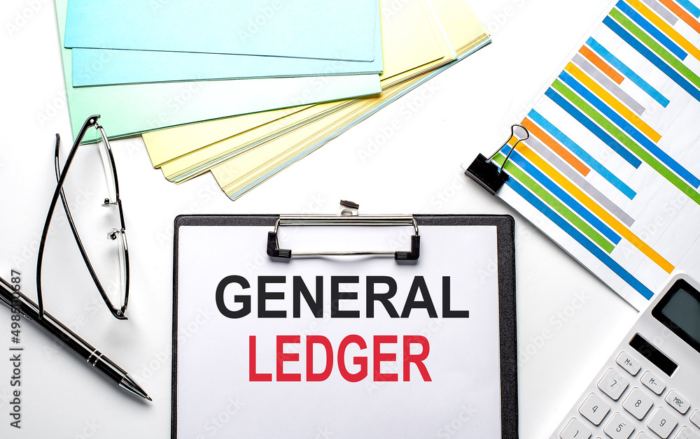 Aufkleber general ledger text on the paper sheet with chart,color paper and calculator