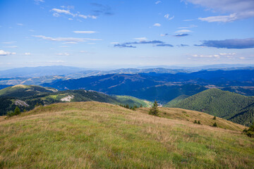 Summer Countryside Mountain Nature Landscape. Picturesque Scenery Green Hills And Fields. Beautiful Blue Sky With Clouds. Visually attractive View Of Mountain Kopaonik, Serbia, Europe.