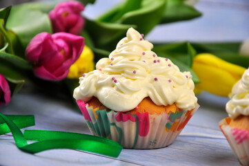 Birthday cupcake with colorful sugar sprinkles.