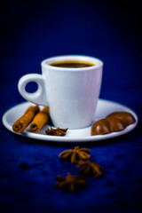Delicious and healthy spicy tea with honey, cinnamon, anis and citrus. Tasty sweets and cake