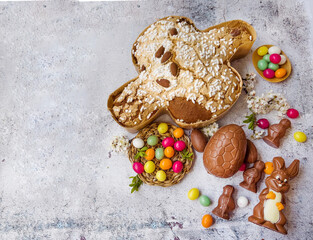 Traditional Italian Easter Dove Bread Colomba , Chocolate Easter Eggs and Cherry Blossoms 