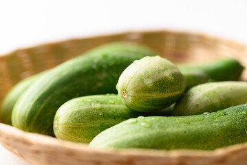 Organic cucumber in bamboo basket, Imperfectly shape