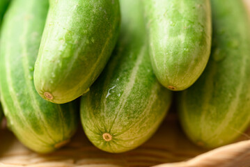 Close up of fresh cucumber in basket, Organic vegetables