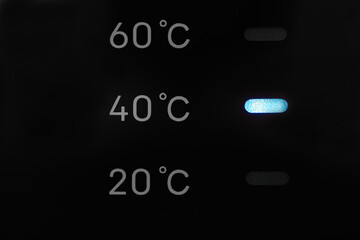 Washing machine display close up.Washing temperature selection 40 degrees.  Abstract laundry...
