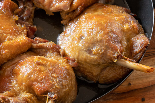 close up of cooked duck confit in dish