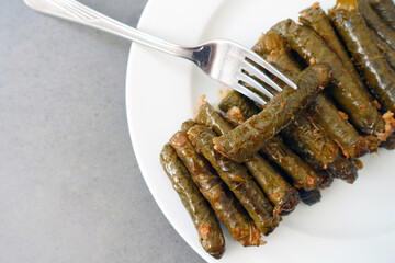 Stuffed Leaf with Olive Oil - Stuffed Grape Leaf-Turkish Stuffed Stuffed Leaf,close-up Grape Leaf Stuffed on Fork,
