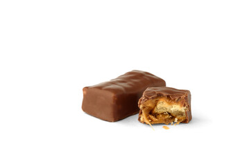 Chocolate sweets with caramel and crackers isolated on white background.
