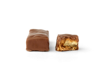 Chocolate sweets with caramel and crackers isolated on white background.
