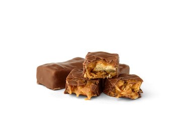 Chocolate sweets with caramel and crackers isolated on white background.