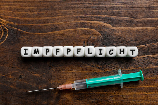 Corona virus Covid-19 vaccine text background in German