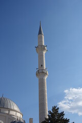 Fototapeta na wymiar minarets reaching towards the blue sky, islam and minaret, minaret architecture in turkey,