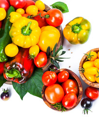 Assorted tomatoes and vegetables isolated on white background. Photo for your design. - 498512405