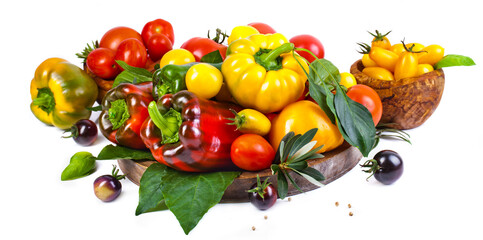 Assorted tomatoes and vegetables isolated on white background. Photo for your design. - 498512411