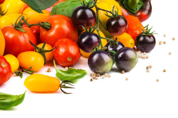 Assorted tomatoes and vegetables isolated on white background. Photo for your design. - 498512418