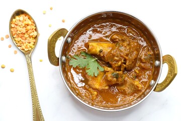 Dal Gosht or Daal Gosht is one of the very popular Mutton Recipes in India. Mutton cooked with spices and mixed lentils. Mutton dalcha with Tur dal and masoor dal. Copy space. Mutton curry in Kadai.