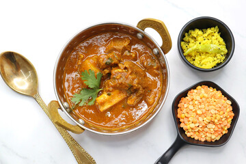 Dal Gosht or Daal Gosht is one of the very popular Mutton Recipes in India. Mutton cooked with spices and mixed lentils. Mutton dalcha with Tur dal and masoor dal. Copy space. Mutton curry in Kadai.