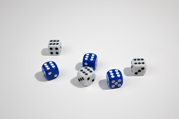 Gambling with dice on a white table