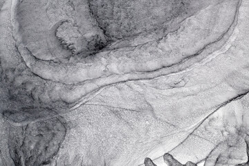 Abstract gray ink watercolor background. Black paint stains and spots in water, luxury fluid liquid art wallpaper