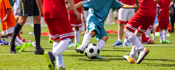 Youth soccer competition.  Boys playing a football game. Soccer match between young school teams....