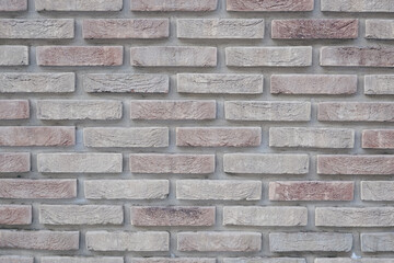 Background. Brick wall. Clinker clay brickwork. red brick wall background, wide panorama of...