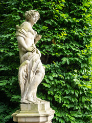 Wilanow, Warsaw, Poland - August 2021: Stone carving in the garden