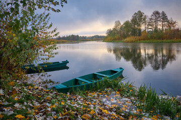 Two boats are on the river in the morning in Ukraine