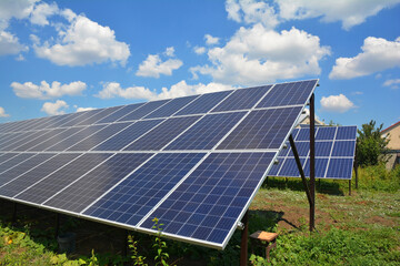 Ground mounted solar panels installed in the backyards of the house to generate alternative and sustainable power.