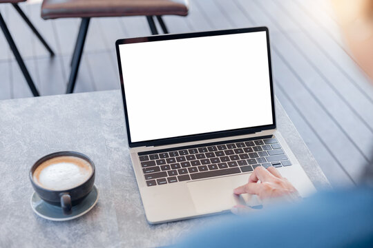 computer screen blank mockup.hand woman work using laptop with white background for advertising,contact business search information on desk at coffee shop.marketing and creative design