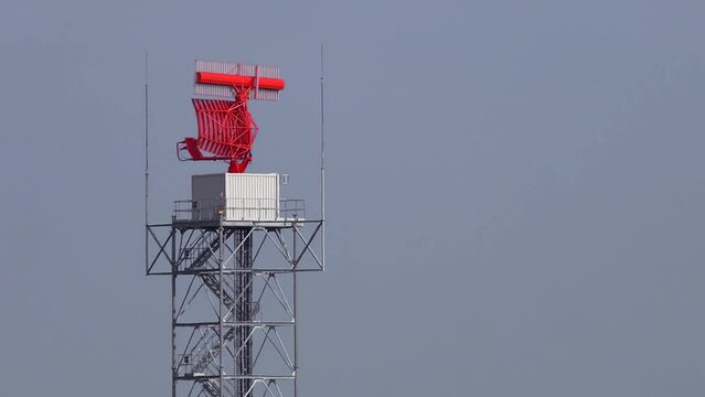 radar dish at an airfield, seamless loop.