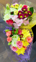 Obraz na płótnie Canvas Grocery store assortment bouquets of spring flowers.