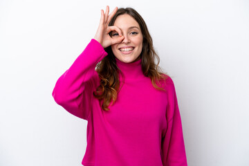 Fototapeta premium Young caucasian woman isolated on white background showing ok sign with fingers