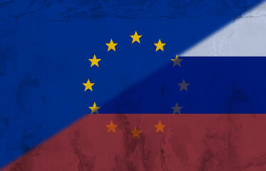 Digital composite image of flag of europe and russia painted on wall, copy space
